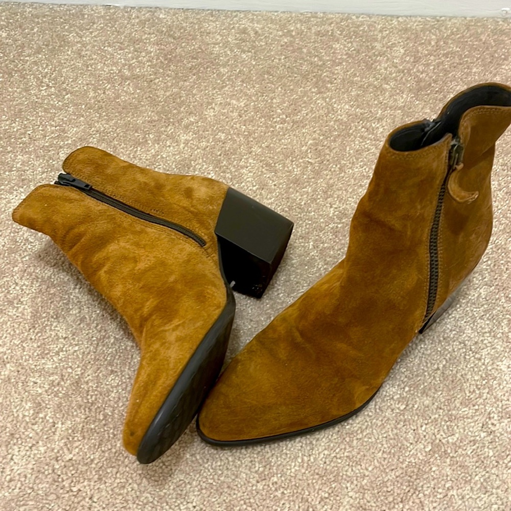 Beautiful suede Clark’s booties.  Never been worn!  Great with jeans or a dress!